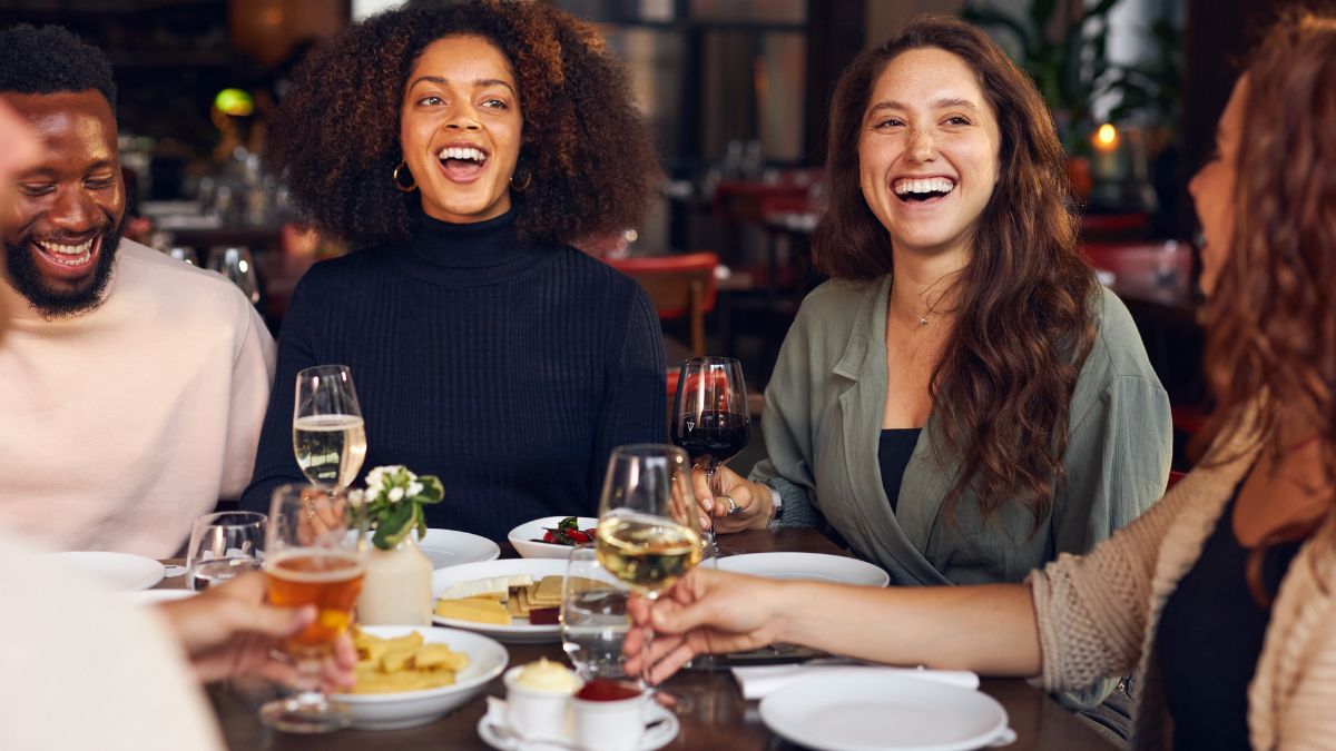 Friends dining in restaurant