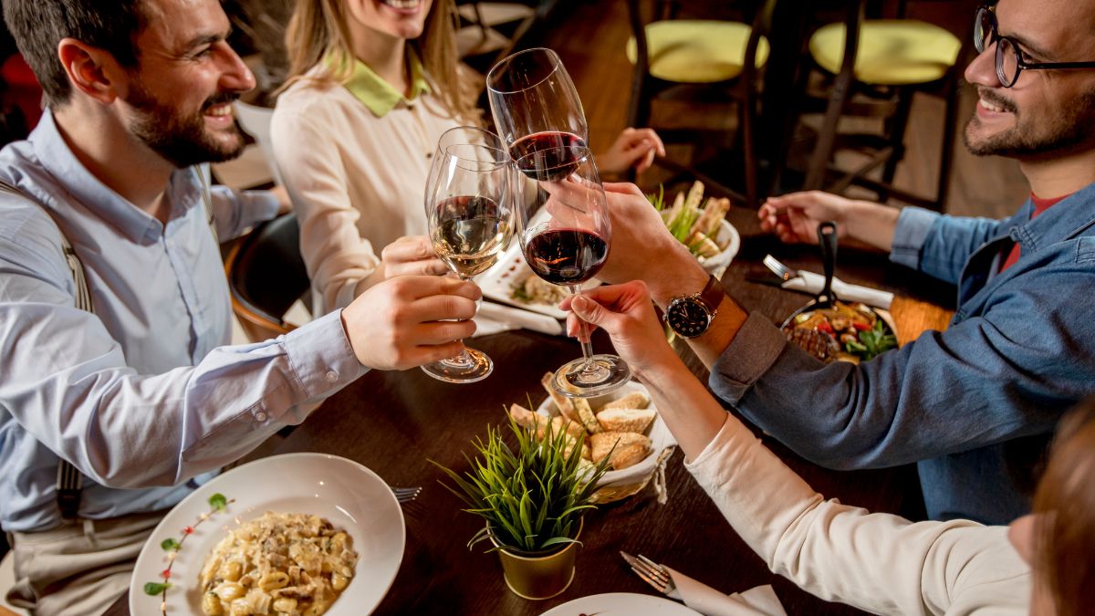 Happy group of friends in restaurant